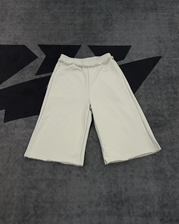 Pantaloncini di cotone OEM all'ingrosso bianco sporco culottes con volant elastico in vita gamba larga stampa Kornit DTGAll'ingrosso Pantaloncini di cotone OEM bianco sporco culottes con volant elastico in vita gamba larga stampa Kornit DTG